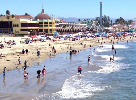 Santa Cruz beach from wharf with people on sand